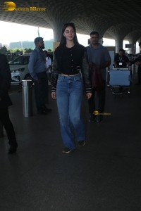 actress Ananya Panday cute in black top and blue denim jeans