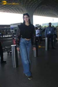 actress Ananya Panday cute in black top and blue denim jeans
