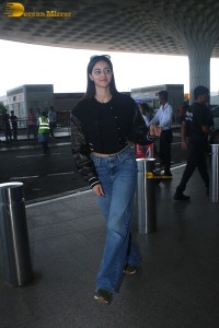actress Ananya Panday cute in black top and blue denim jeans