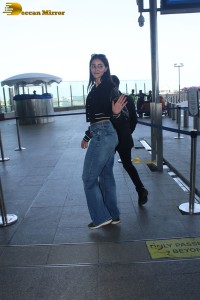 actress Ananya Panday cute in black top and blue denim jeans