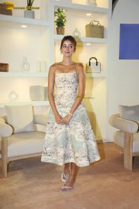 actress Ananya Panday pretty in a shoulderless white dress at an event