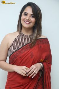 actress Anasuya Bharadwaj beautiful in a red saree