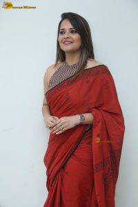 actress Anasuya Bharadwaj beautiful in a red saree