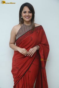 actress Anasuya Bharadwaj beautiful in a red saree