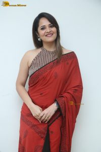 actress Anasuya Bharadwaj beautiful in a red saree