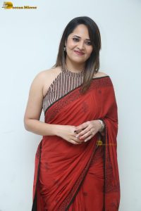 actress Anasuya Bharadwaj beautiful in a red saree