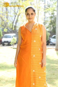Anchor Anasuya Bharadwaj in a orange salwar kameez dress