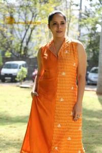 Anchor Anasuya Bharadwaj in a orange salwar kameez dress