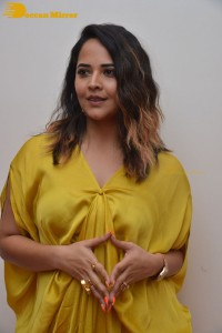 Anchor and Actress Anasuya Bharadwaj photoshoot in a yellow dress