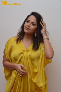 Anchor and Actress Anasuya Bharadwaj photoshoot in a yellow dress