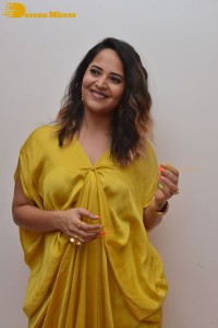 Anchor and Actress Anasuya Bharadwaj photoshoot in a yellow dress
