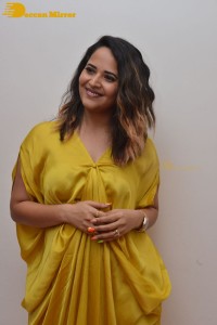 Anchor and Actress Anasuya Bharadwaj photoshoot in a yellow dress