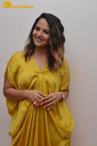 Anchor and Actress Anasuya Bharadwaj photoshoot in a yellow dress