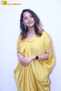 Anchor and Actress Anasuya Bharadwaj photoshoot in a yellow dress