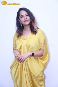 Anchor and Actress Anasuya Bharadwaj photoshoot in a yellow dress