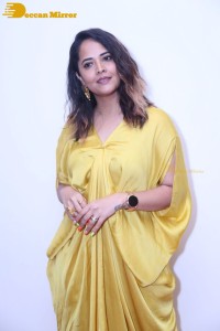 Anchor and Actress Anasuya Bharadwaj photoshoot in a yellow dress