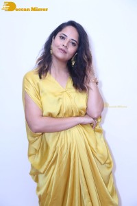 Anchor and Actress Anasuya Bharadwaj photoshoot in a yellow dress