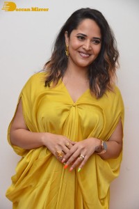 Anchor and Actress Anasuya Bharadwaj photoshoot in a yellow dress