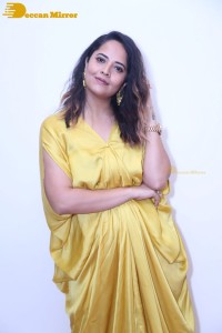 Anchor and Actress Anasuya Bharadwaj photoshoot in a yellow dress