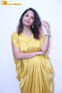 Anchor and Actress Anasuya Bharadwaj photoshoot in a yellow dress