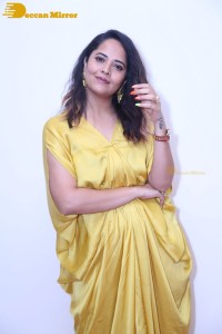 Anchor and Actress Anasuya Bharadwaj photoshoot in a yellow dress