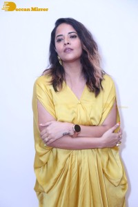 Anchor and Actress Anasuya Bharadwaj photoshoot in a yellow dress