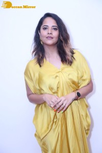 Anchor and Actress Anasuya Bharadwaj photoshoot in a yellow dress