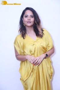 Anchor and Actress Anasuya Bharadwaj photoshoot in a yellow dress