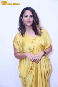 Anchor and Actress Anasuya Bharadwaj photoshoot in a yellow dress
