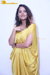 Anchor and Actress Anasuya Bharadwaj photoshoot in a yellow dress