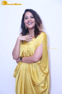 Anchor and Actress Anasuya Bharadwaj photoshoot in a yellow dress