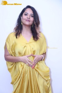 Anchor and Actress Anasuya Bharadwaj photoshoot in a yellow dress
