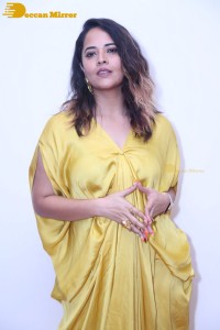 Anchor and Actress Anasuya Bharadwaj photoshoot in a yellow dress