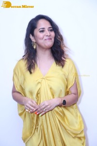 Anchor and Actress Anasuya Bharadwaj photoshoot in a yellow dress