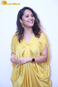 Anchor and Actress Anasuya Bharadwaj photoshoot in a yellow dress