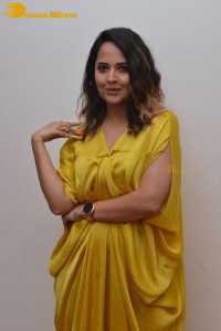 Anchor and Actress Anasuya Bharadwaj photoshoot in a yellow dress
