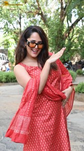 anchor and actress anasuya bharadwaj photoshoot in a red dress