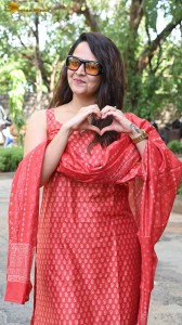 anchor and actress anasuya bharadwaj photoshoot in a red dress