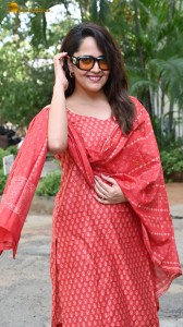 anchor and actress anasuya bharadwaj photoshoot in a red dress