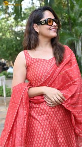 anchor and actress anasuya bharadwaj photoshoot in a red dress