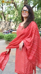 anchor and actress anasuya bharadwaj photoshoot in a red dress