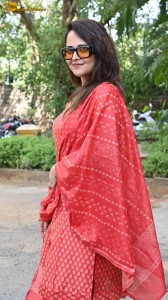 anchor and actress anasuya bharadwaj photoshoot in a red dress