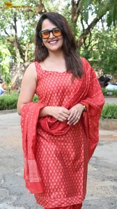 anchor and actress anasuya bharadwaj photoshoot in a red dress