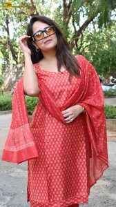 anchor and actress anasuya bharadwaj photoshoot in a red dress