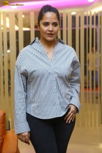 anchor and actress Anasuya Bharadwaj photoshoot in a shirt