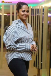 anchor and actress Anasuya Bharadwaj photoshoot in a shirt