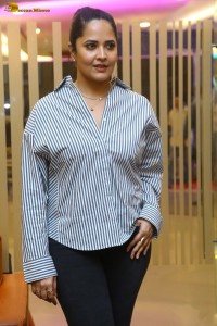 anchor and actress Anasuya Bharadwaj photoshoot in a shirt