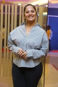 anchor and actress Anasuya Bharadwaj photoshoot in a shirt