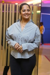 anchor and actress Anasuya Bharadwaj photoshoot in a shirt