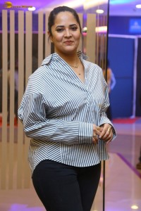 anchor and actress Anasuya Bharadwaj photoshoot in a shirt